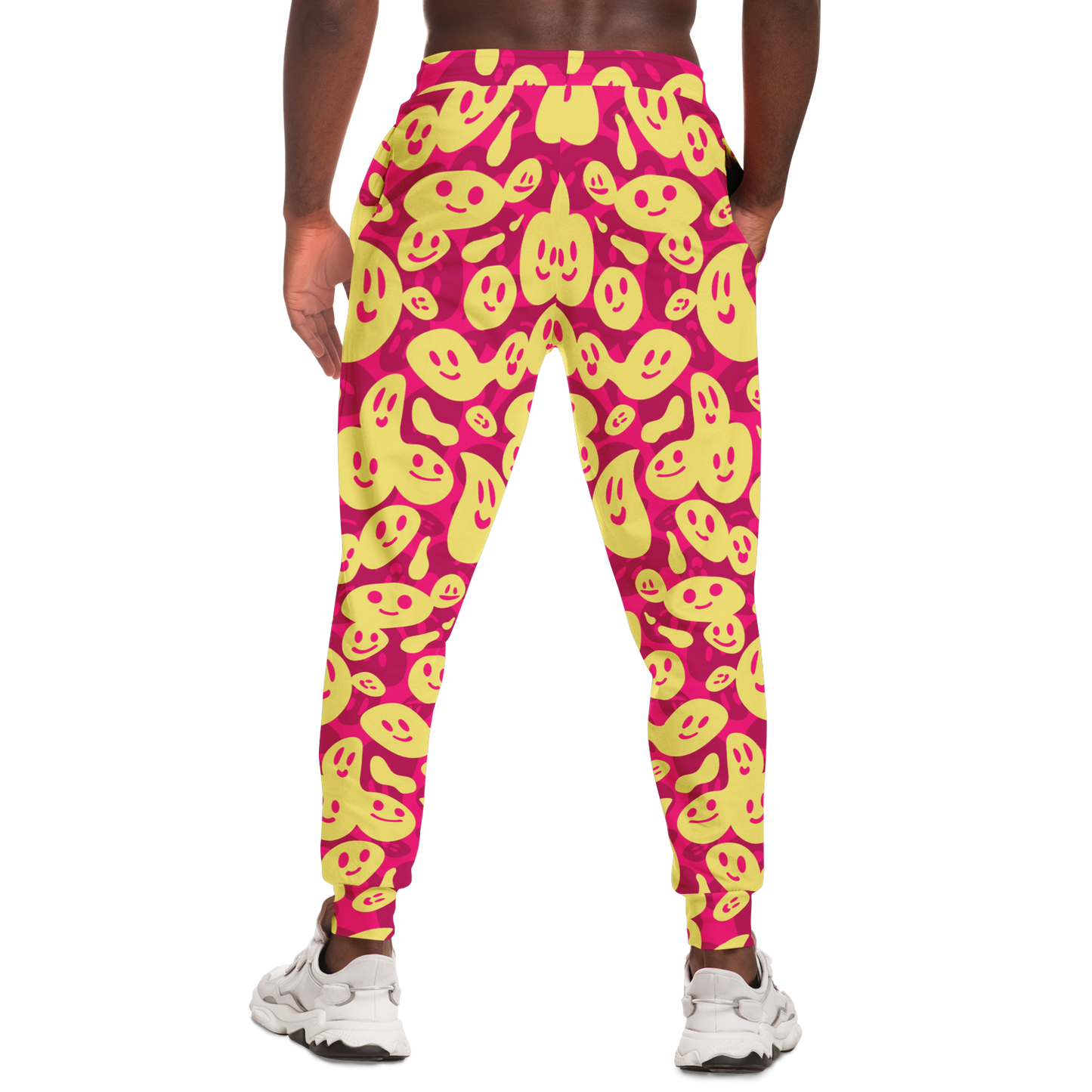 Smiley Loop Joggers – Action-ready pose with bright emoji pattern, ideal for casual style
