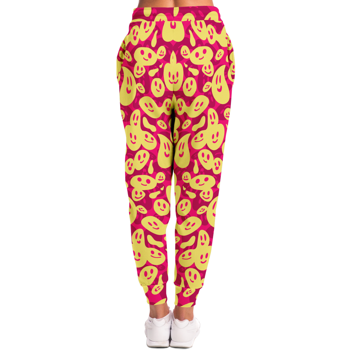 Smiley Loop Joggers – Action-ready women pose with bright emoji pattern, ideal for casual style