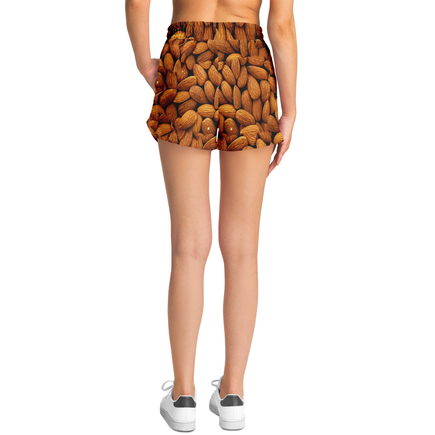 Female model wearing Almond Flex Shorts back view with almond design