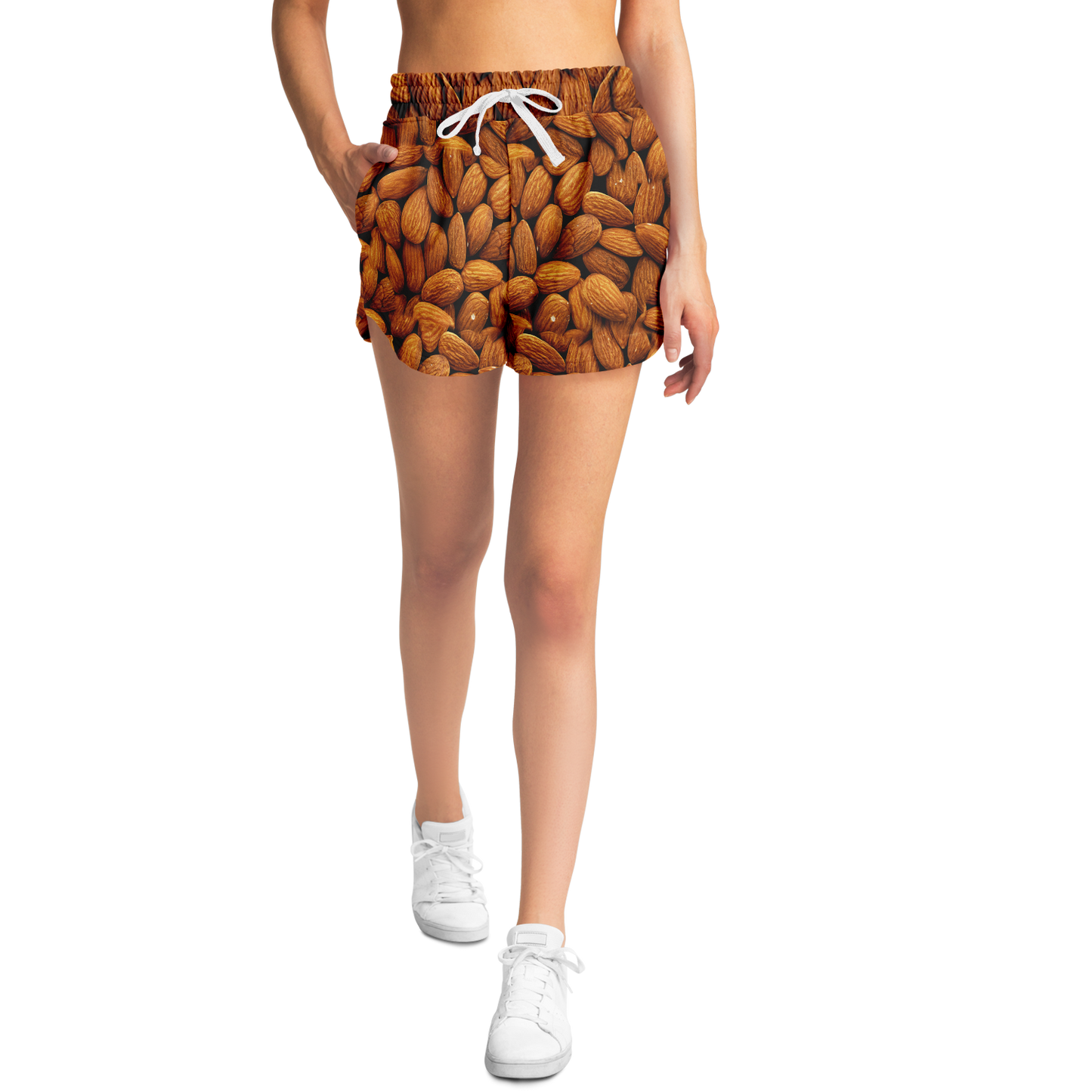 Female model wearing Almond Flex Shorts front view with almond design