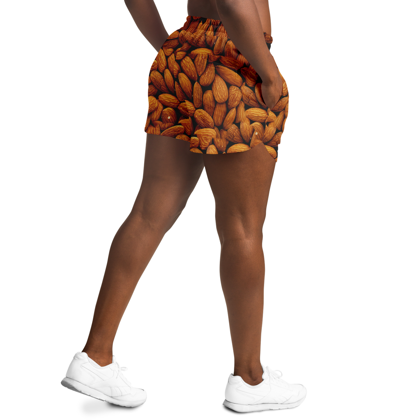 Model wearing Almond Flex Shorts side view with almond pattern design
