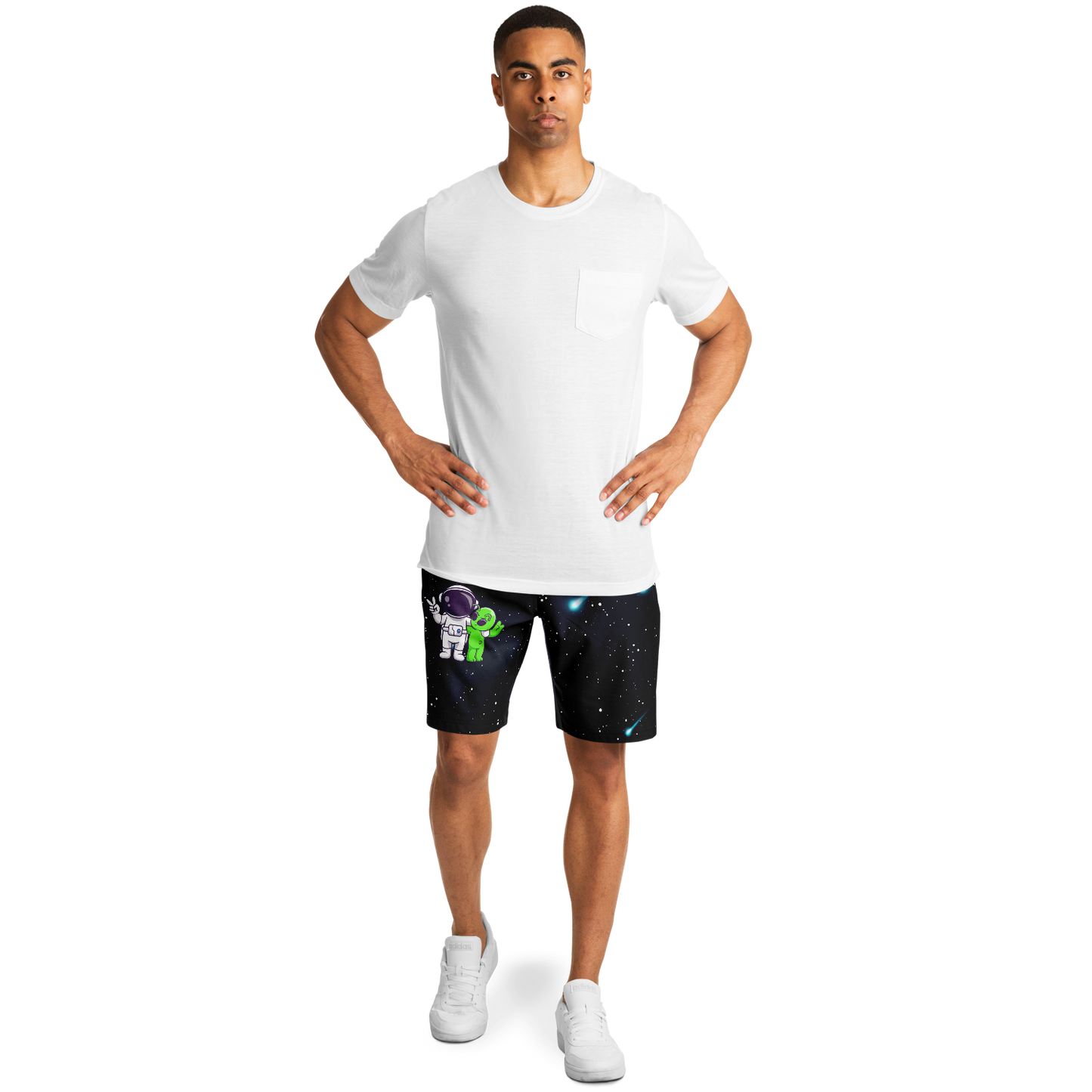 Full body male model wearing Cosmic Buddies Shorts with astronaut and alien graphic, transparent background