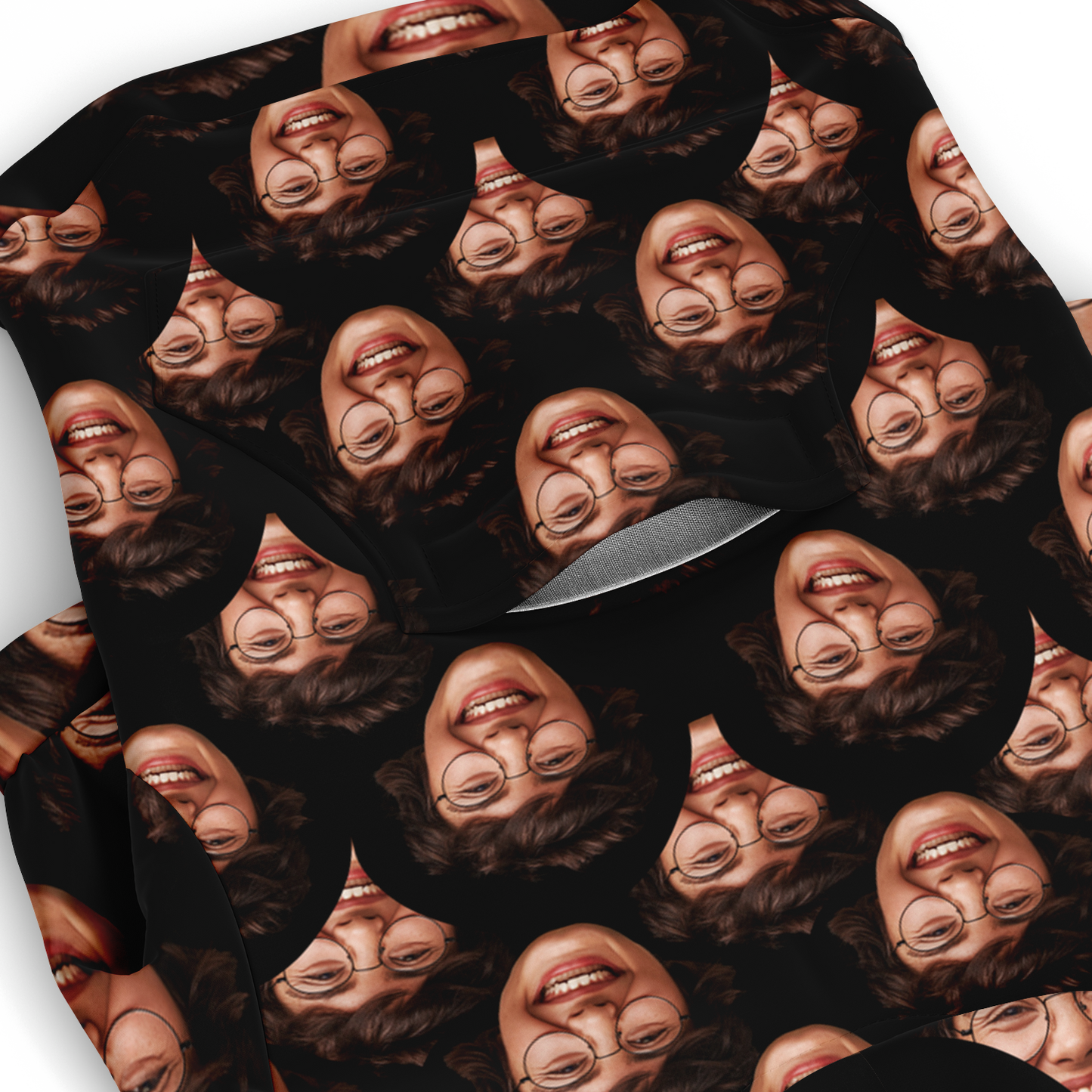 Close-up of printed dog face design on custom dog hoodie fabric