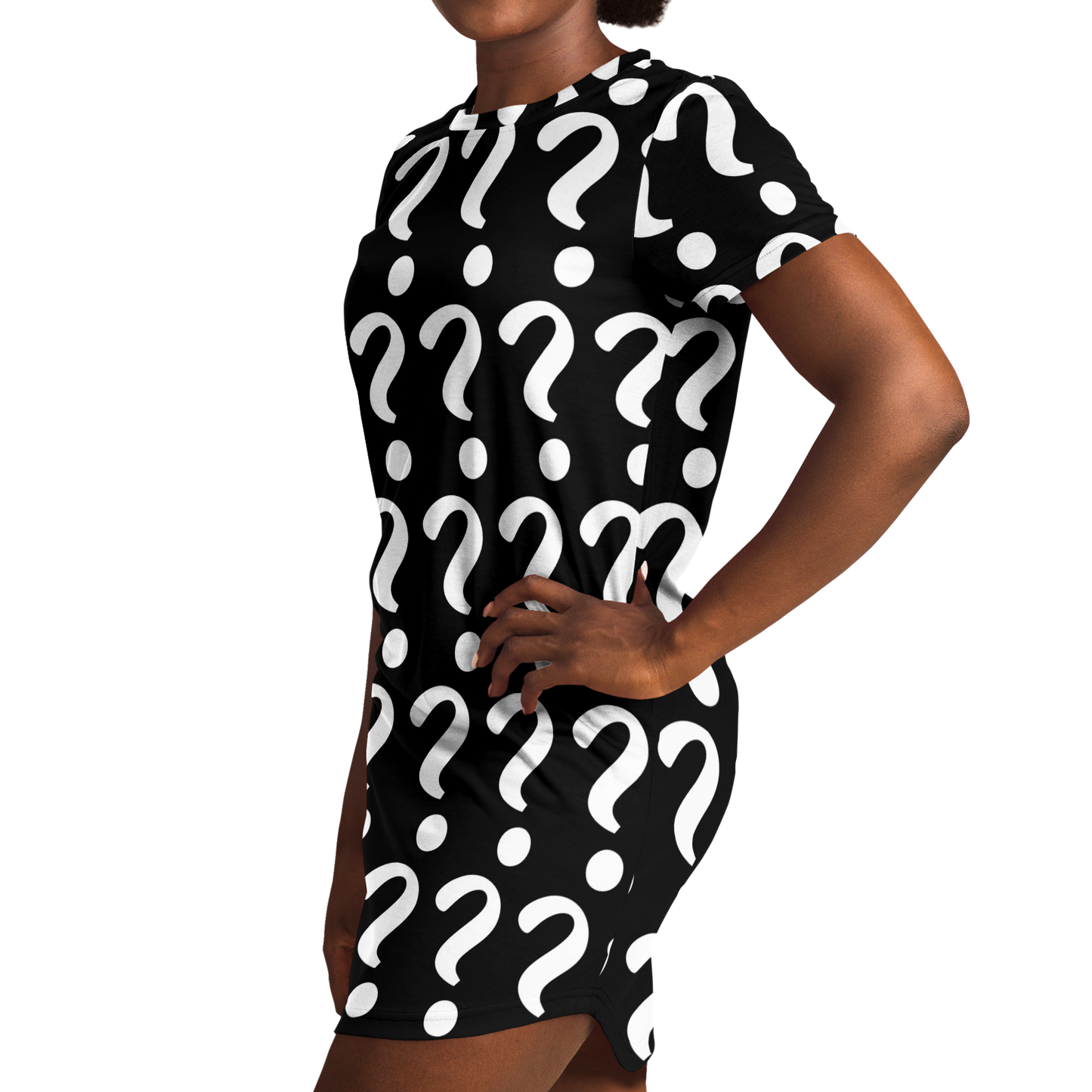 Side profile view of a woman wearing a custom T-shirt dress with all-over placeholder print, hands on hips in confident stance