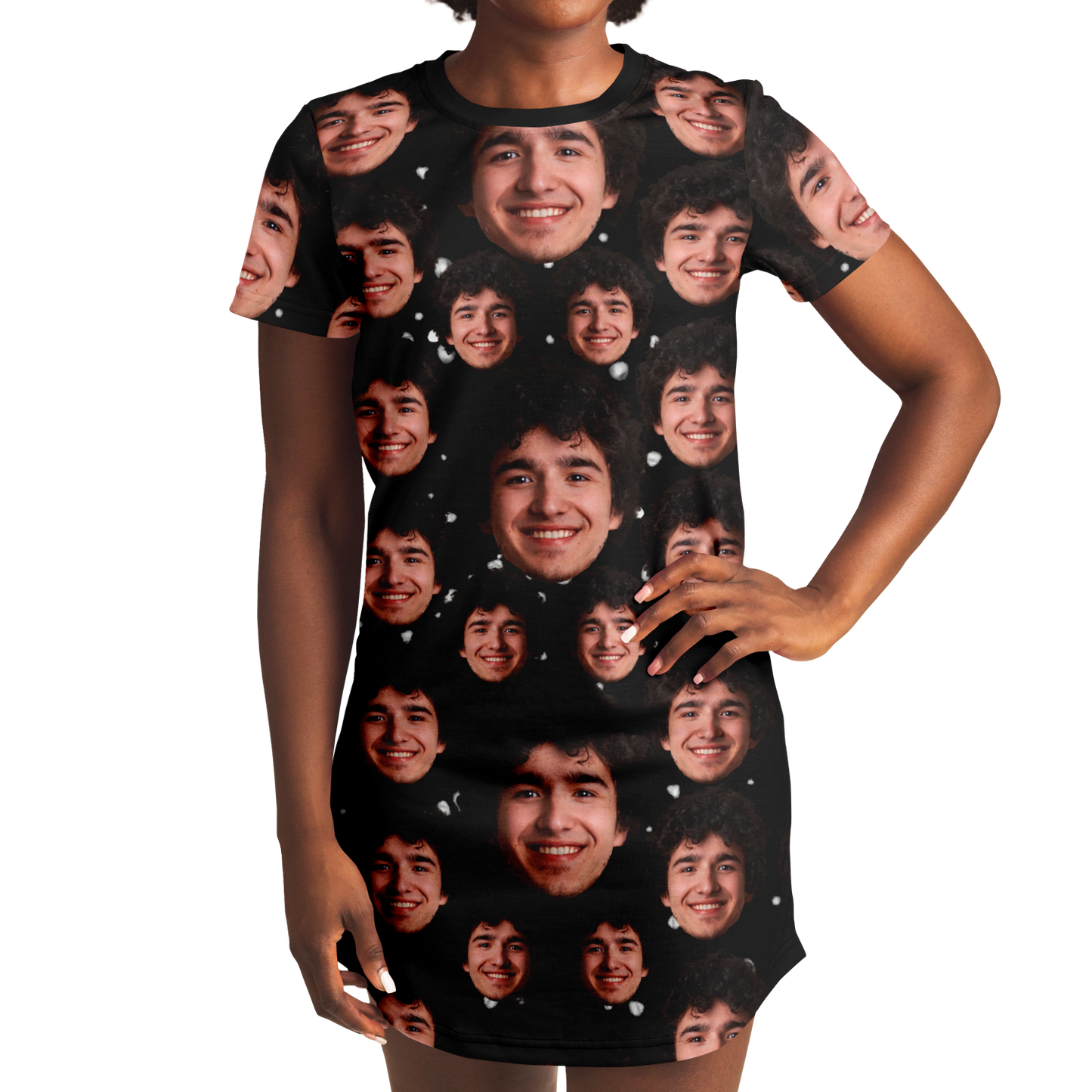 Woman modeling custom face t-shirt dress, hands on hips, black background with face design