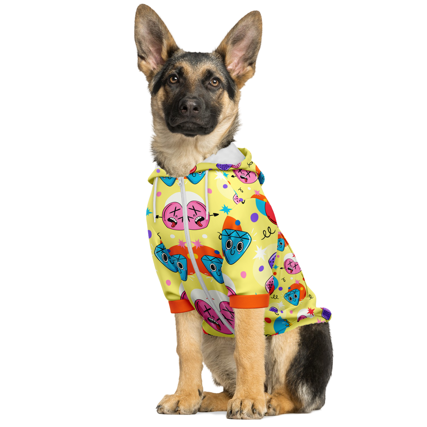 Dog sitting in emoji print dog hoodie with all-over fun expressions