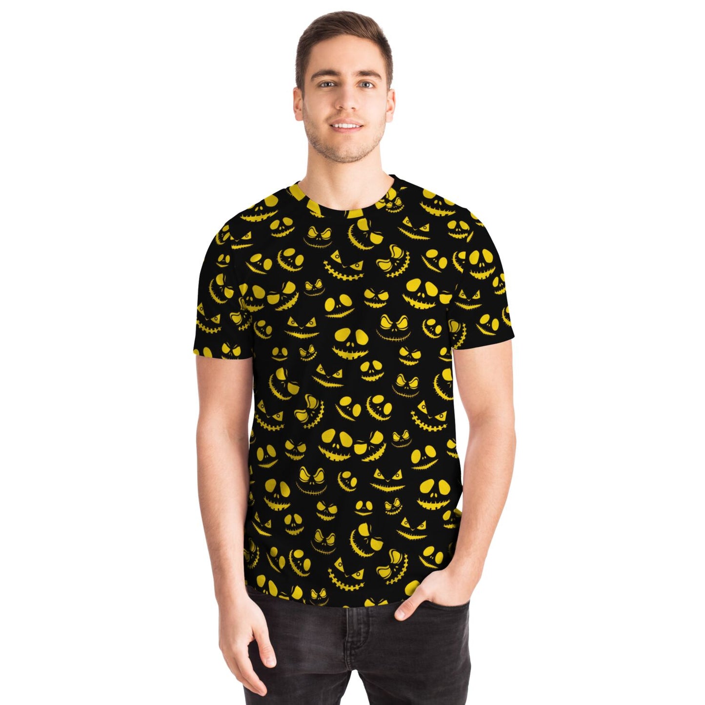 Man wearing a black t-shirt with yellow jack-o'-lantern pattern on a black background