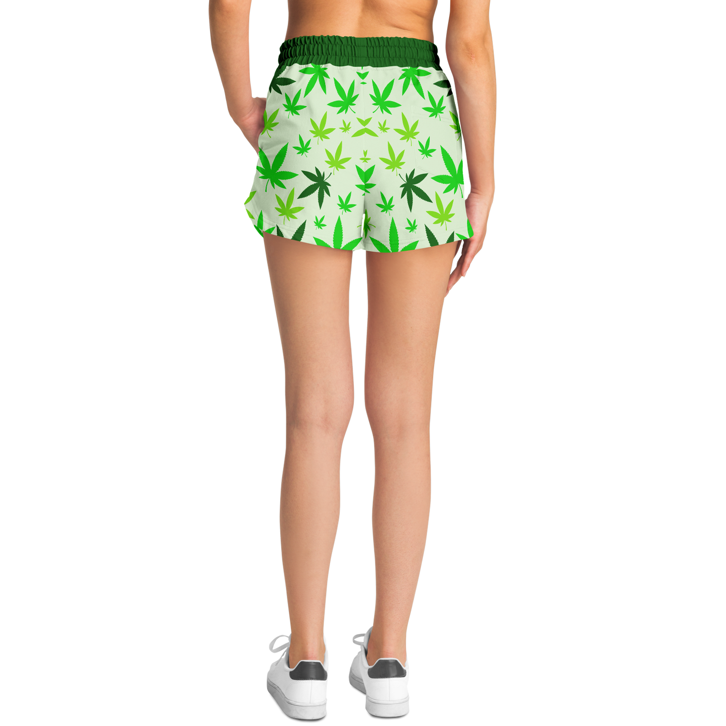 Model wearing High Vibe Shorts back view with green cannabis leaf design