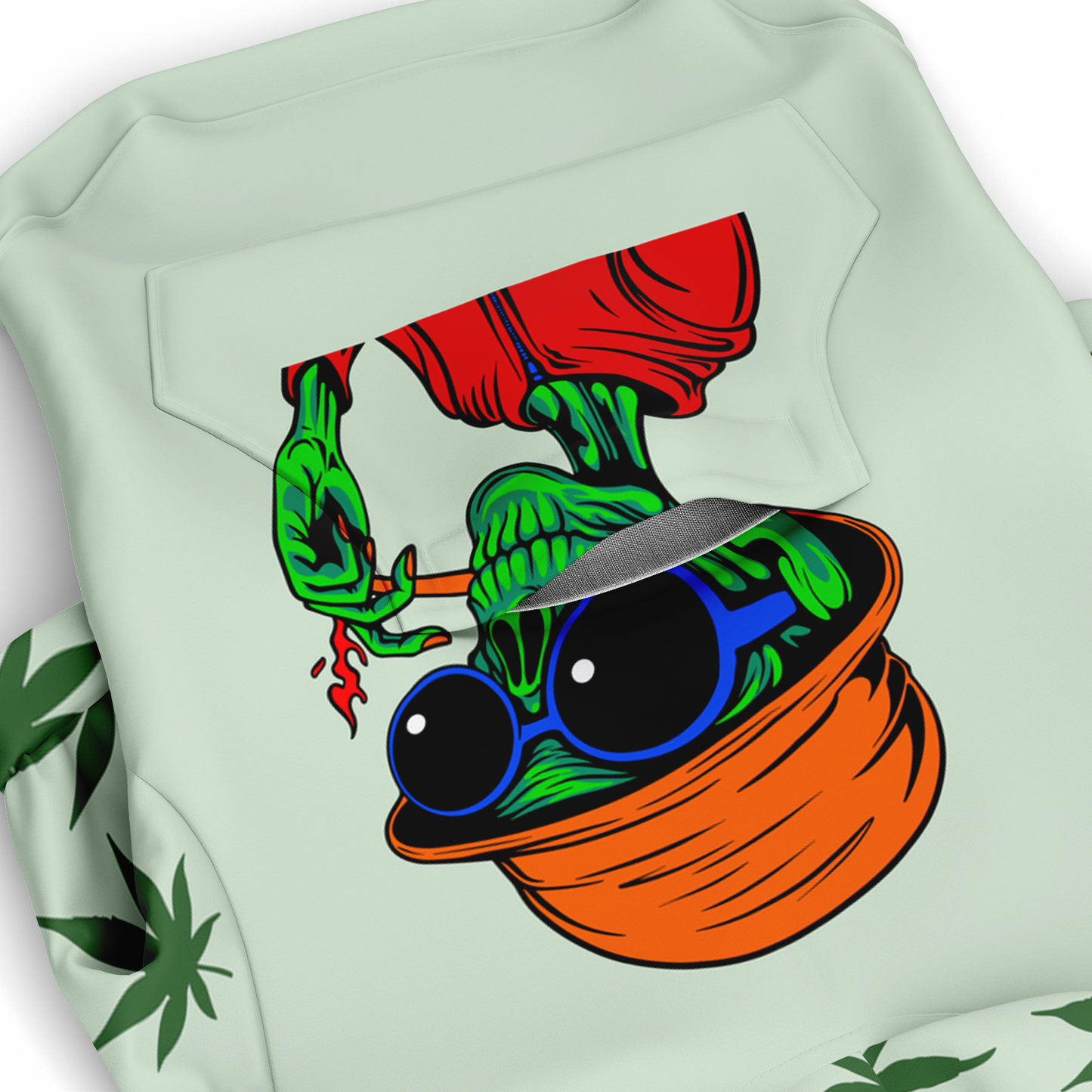 Close-up of cartoon-style artwork on the back of leaves print dog hoodie