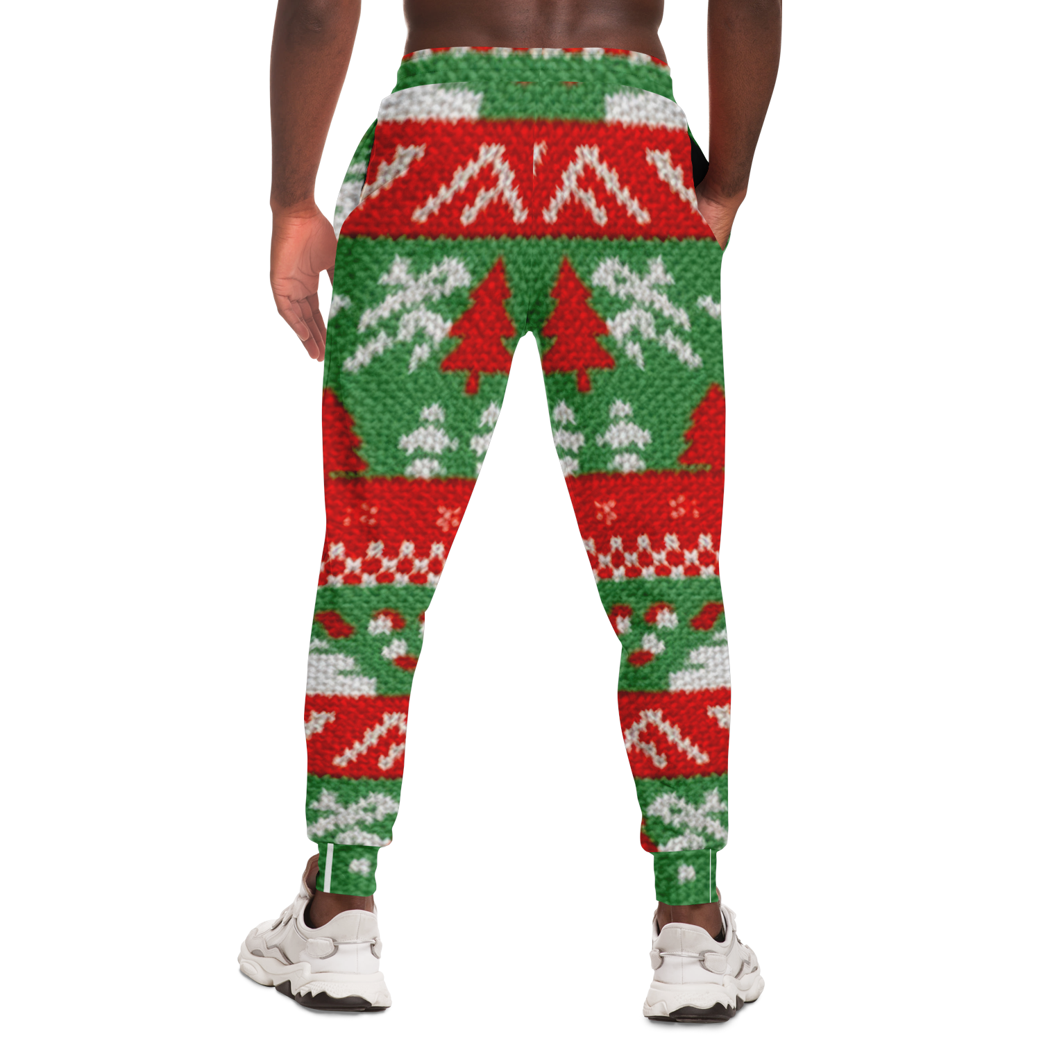 Back view of the male wearing Christmas joggers showing detailed festive knit pattern with red, green, and white design 