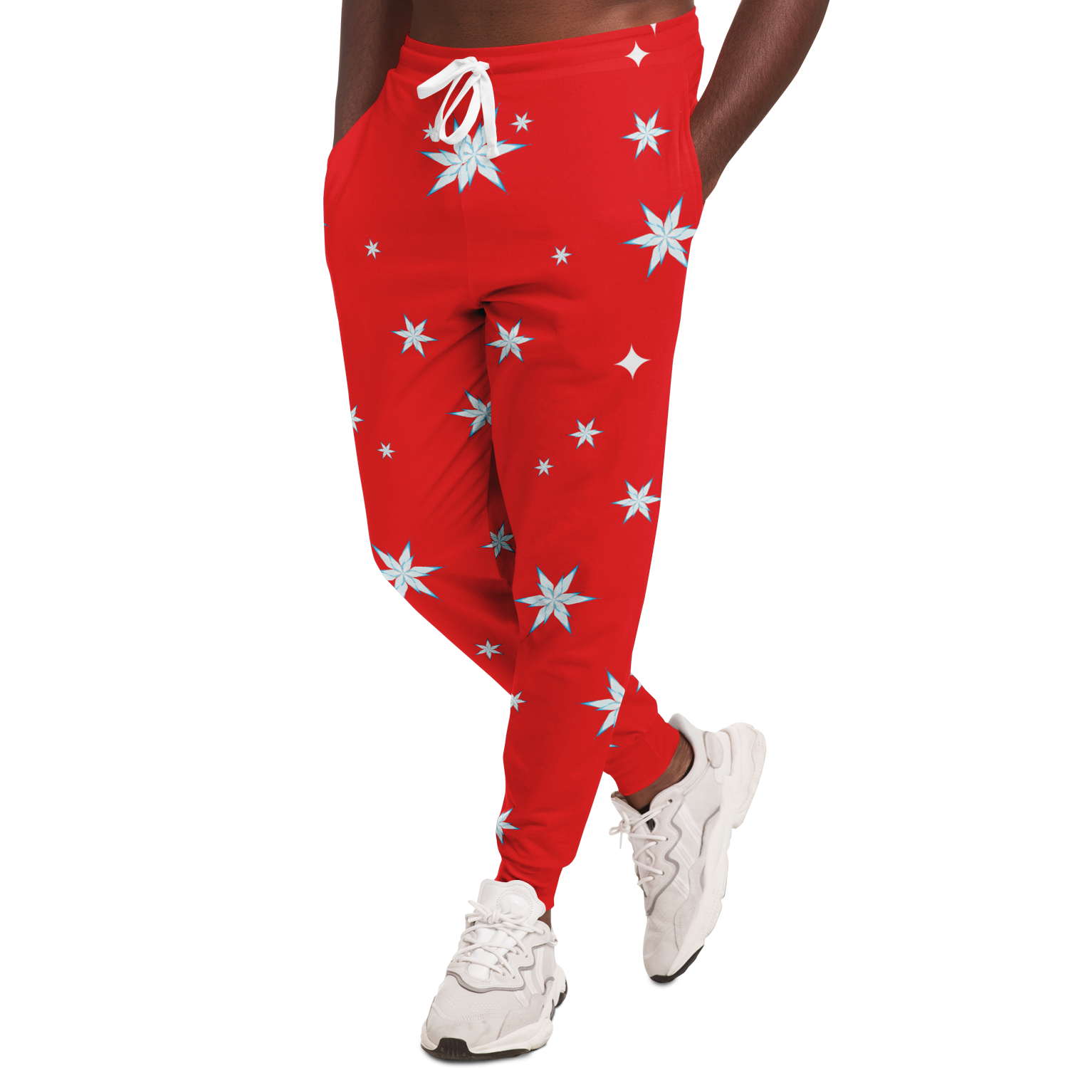 Close-up view of Festive Glow Joggers leg with Christmas star print