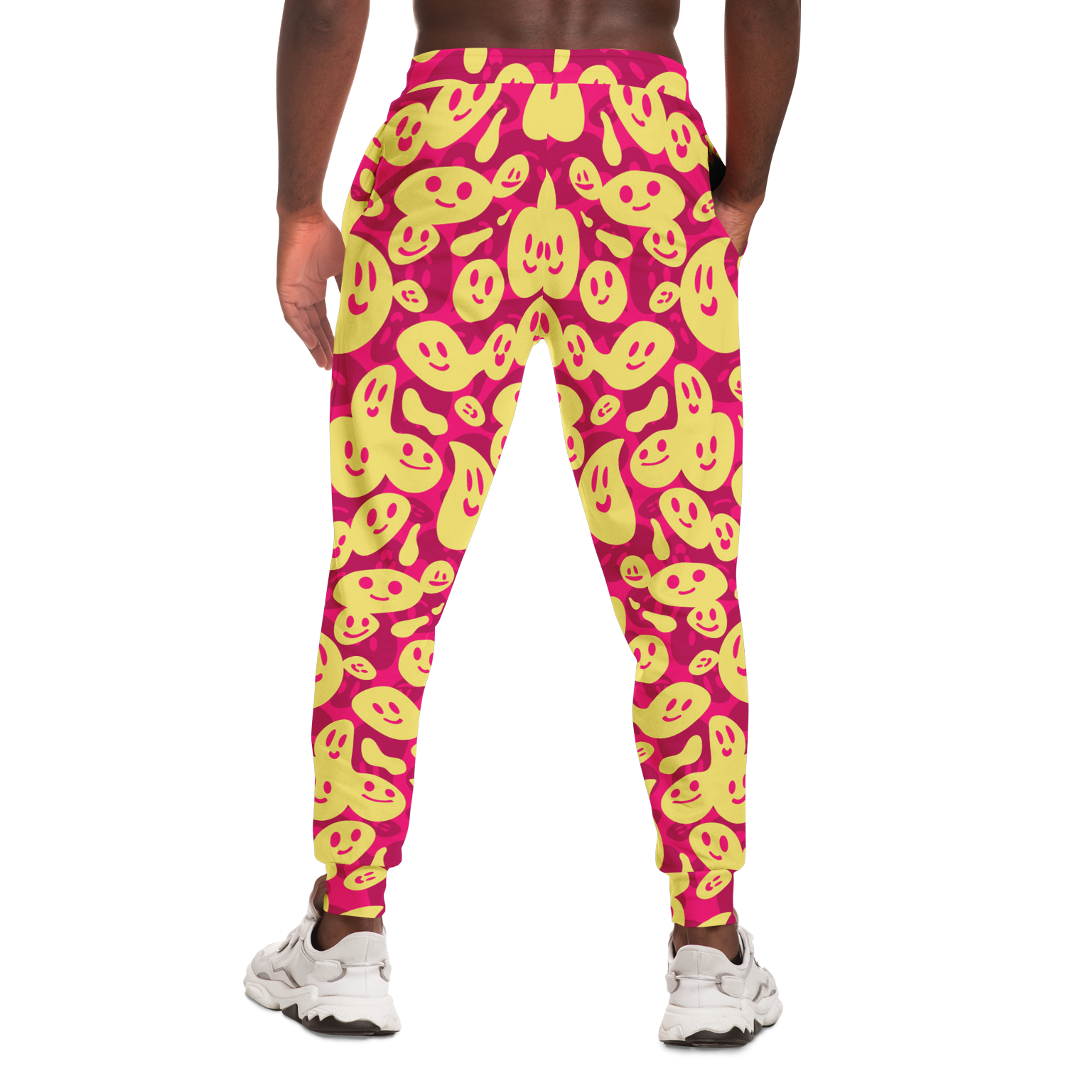  Smiley Loop Joggers – Action-ready pose with bright emoji pattern, ideal for casual style