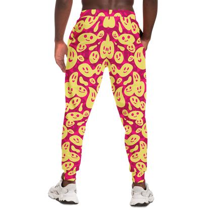  Smiley Loop Joggers – Action-ready pose with bright emoji pattern, ideal for casual style