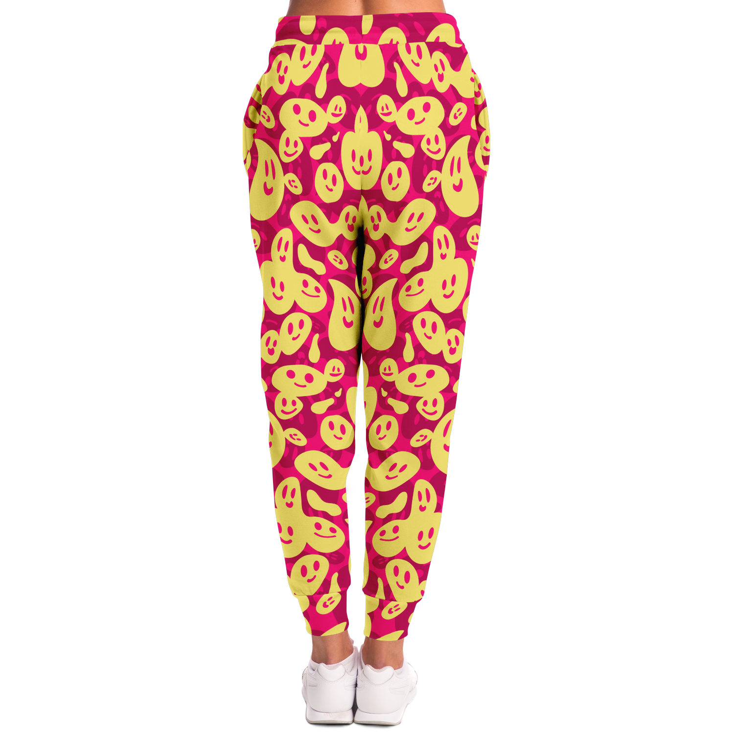  Smiley Loop Joggers – Action-ready women pose with bright emoji pattern, ideal for casual style
