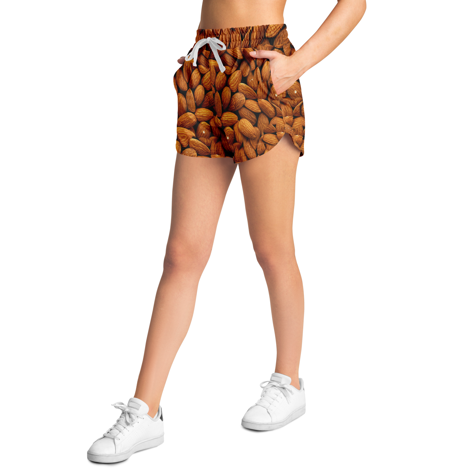Female model wearing Almond Flex Shorts side view with almond design