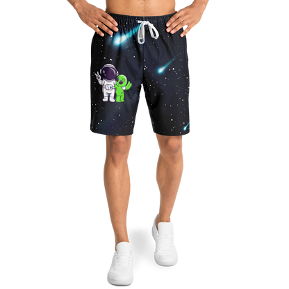 Male model wearing Cosmic Buddies Shorts front view with astronaut and alien graphic, transparent background

