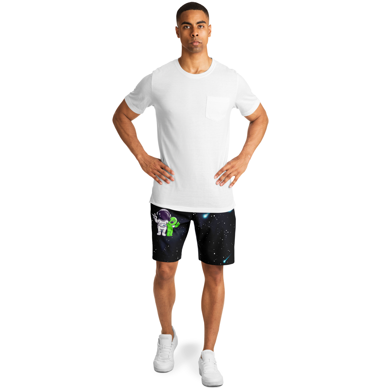 Full body male model wearing Cosmic Buddies Shorts with astronaut and alien graphic, transparent background