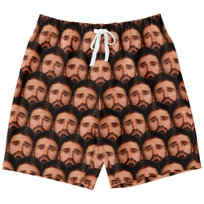 Front flat lay of shorts featuring a high-definition custom face print and adjustable white drawstring.