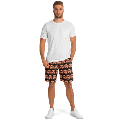  Lifestyle image of model in t-shirt and custom face print shorts, styled for casual everyday wear.