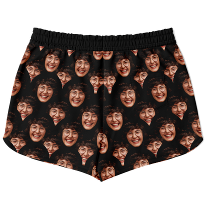 Flatlay back view of Custom Face Shorts with repeating custom face design