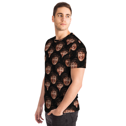  Left side angle of male model in Custom Face T-Shirt featuring repeating face graphics
