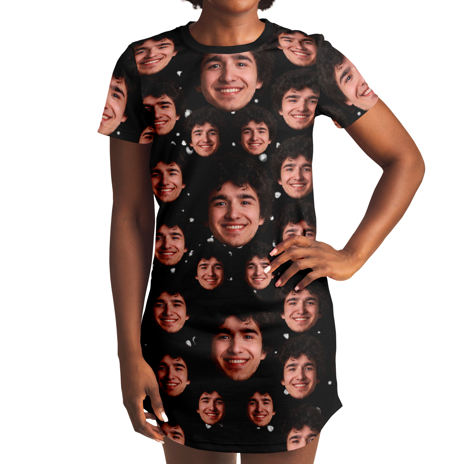 Woman modeling custom face t-shirt dress, hands on hips, black background with face design