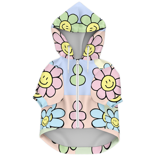 Front flat lay of floral print dog hoodie with pastel smiley flowers and zipper