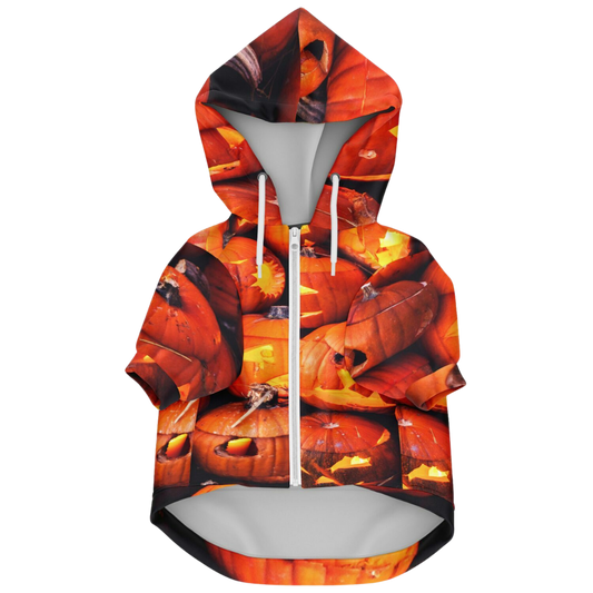Front view of the Halloween pumpkin dog hoodie laid flat, showing the white zipper and hood.
