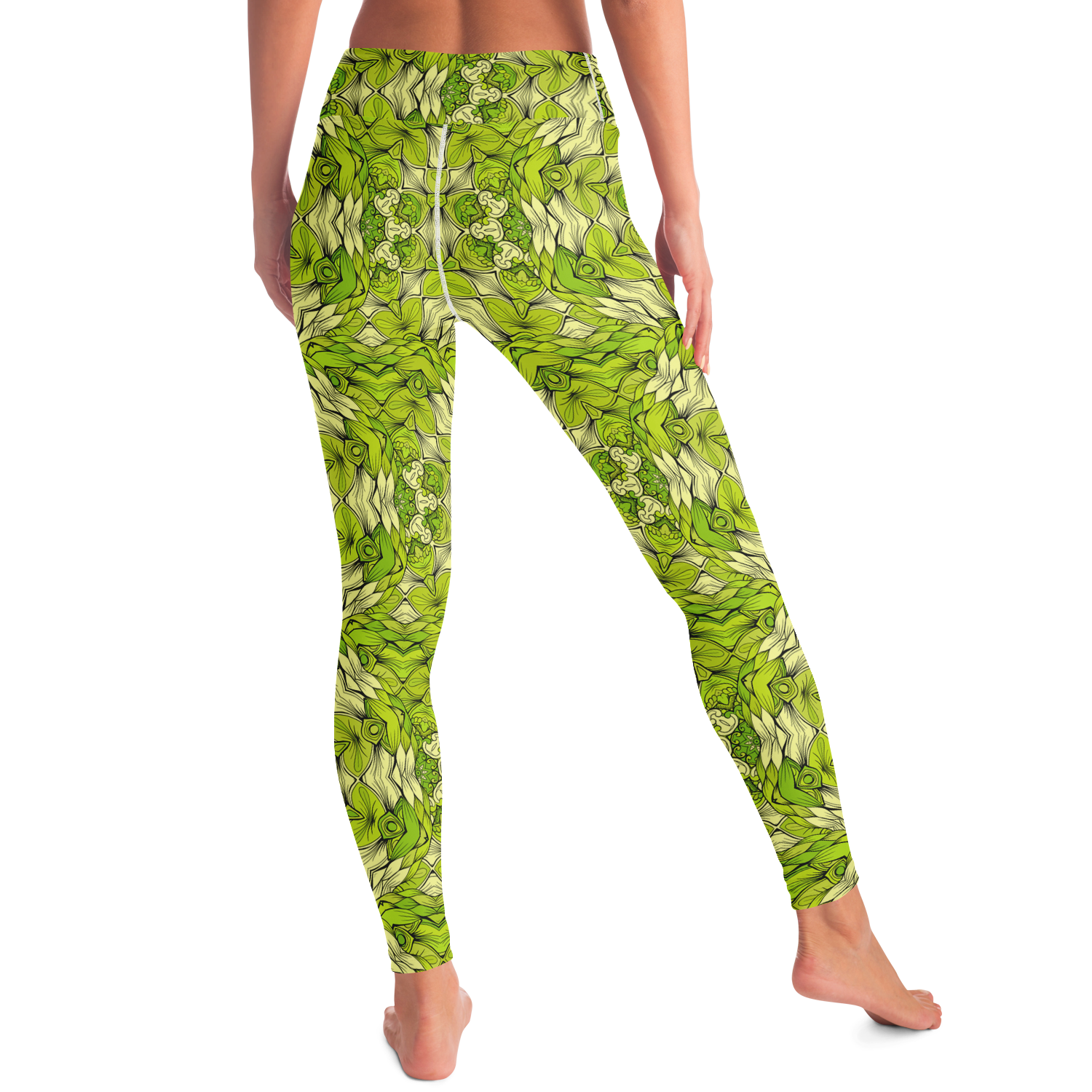 Back angled view of green leaf print leggings featuring artistic botanical design
