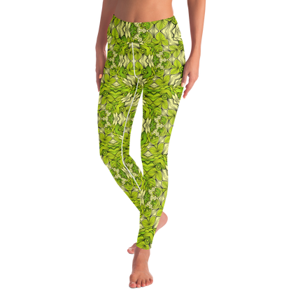 Front view of leaf print leggings in walking pose with vibrant green botanical patter