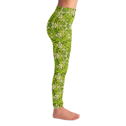 Right side view of green leaf print leggings featuring an intricate botanical pattern