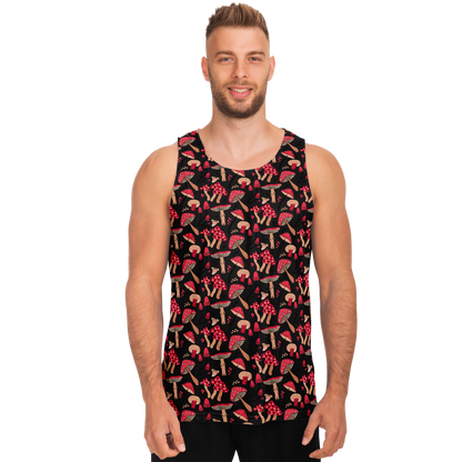 Male model standing front-facing wearing Nature Groove Tank Top with bold red mushroom and leaf pattern on black background