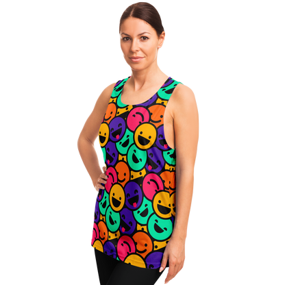 Side view of woman posing in Smiley Print Tank Top with hand on hip showing colorful artwork