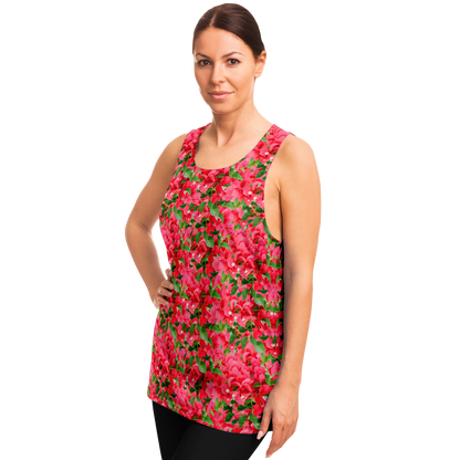 Side profile of female model in Tropical Bloom Tank Top featuring pink and green botanical graphics