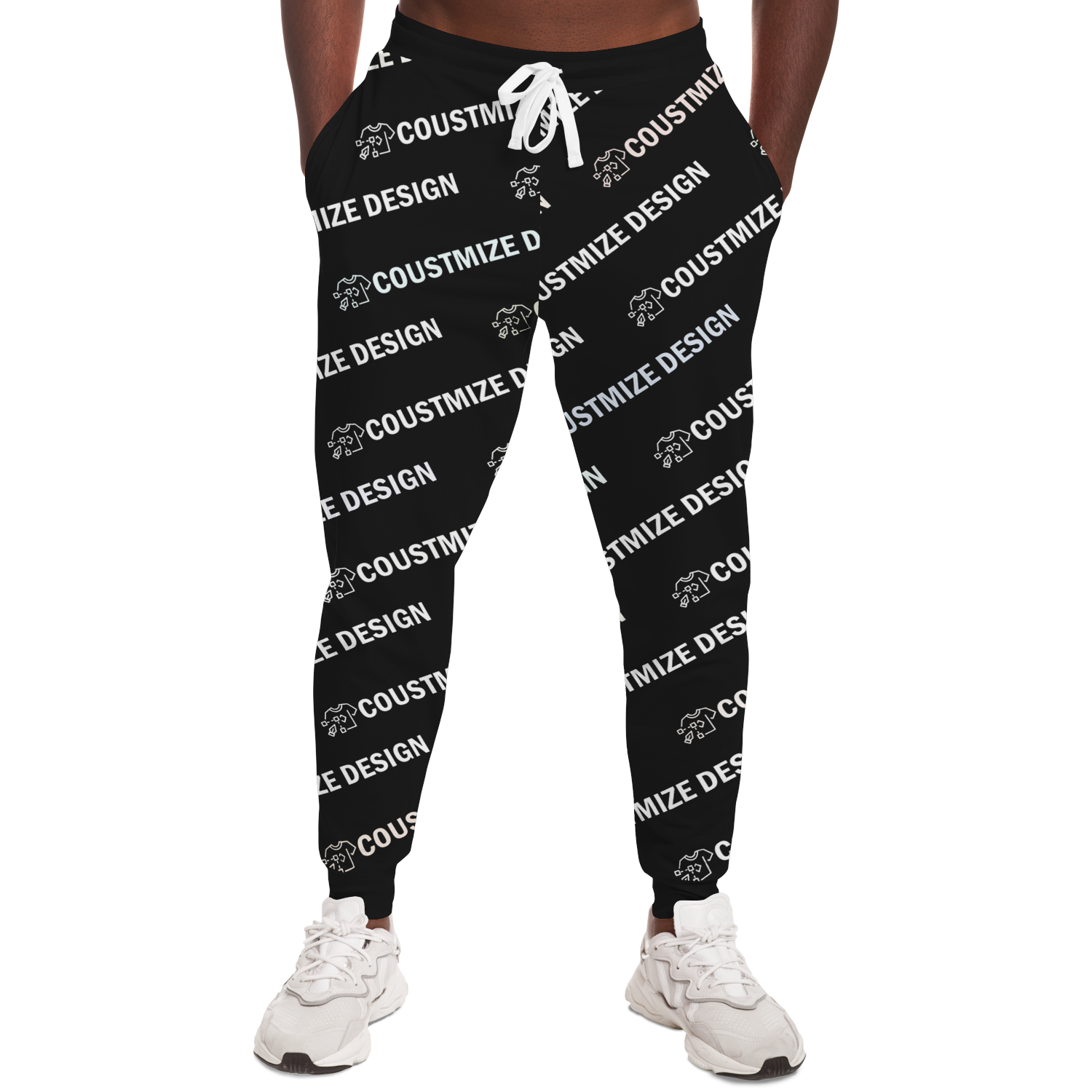 Man wearing black custom joggers featuring "YOUR DESIGN HERE" print, front view